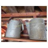 2 galvanized sprinkling cans