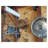 Havahart animal trap hubcap wind garden decor