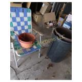 2 trash cans tomato cages lawn chair planters