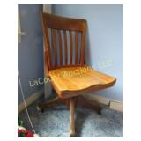 vintage office chair on wheels