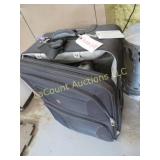 suitcase w air mattress instabed