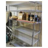 wire shelving unit on wheels & light fixture