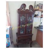 dark mahogany Chipendale style cabinet display