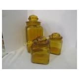 3 vintage amber canisters