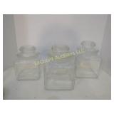 3 clear canisters