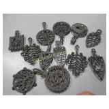 many vintage cast trivets
