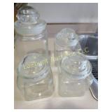 4 canisters clear