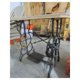 table made from cast sewing machine base