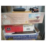 assorted jigsaw puzzles pig game watch