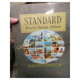 2 stamp album w stamps
