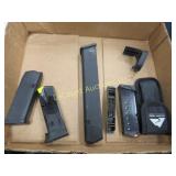 assorted gun parts magazines some ammo