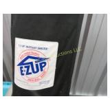 EZ UP tent on wheeled case excellent condition