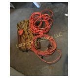 3 extension cords, 2 orange one older yellow 3 extension cords, 2 orange one older yellow
