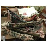 many fabric cloth baskets some napkins etc