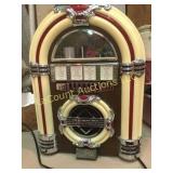 Crosley radio tape player looks like juke box