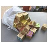 bag of raised letter wood wooden blocks