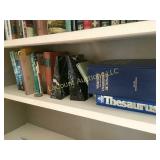shelf of assorted reading books marble bookends