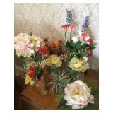 assorted realistic looking floral displays vases