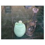 little green alcohol jug and glass caraffe
