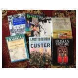 assorted books Custer Human Venture