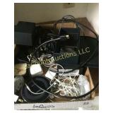 assorted phone elecronics ear buds chargers