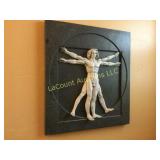 male wall plaque hanging