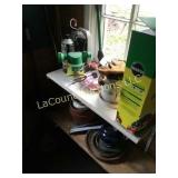 assorted gardening items miracle grow pretty full