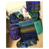 assorted camping gear bag matt dishes