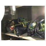nags of holiday garland wrapped packages