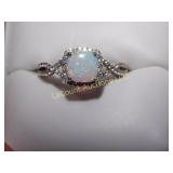 1/4 ct Opal Infinity ring, stamped silver 925