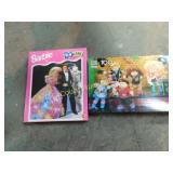 2 unopened puzzles