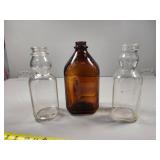 Two Cream Top Quart and One Brown Half Gallon Milk