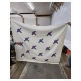 Hand-Stitched Quilt with Purple Floral Motif