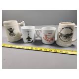 Four Collectible Aviation-Themed Mugs