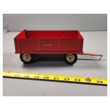McCormick Toy Wagon with Red Metal Body and Rubber