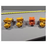 Four Die-Cast Model Dump Trucks