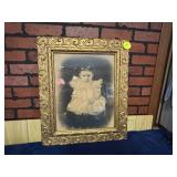 Ornate Gilded Frame with Sepia-Toned Photograph of