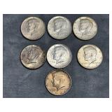 Seven 1964 Kennedy Half Dollar Coins