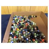 Glass Marbles in a Cardboard Box