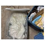 Two Plastic Storage Totes Containing Various Fabri