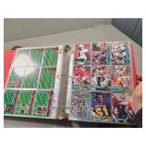Binder with Assorted Sports Cards Featuring Footba