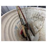 Bucket Containing Fishing Poles, Reels, and Suppli