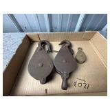 Three Metal Hook Pulleys in Various Sizes