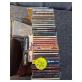 Two Boxes of Assorted Music CDs