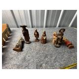 Hand-Carved and Painted Figurines in Various Desig