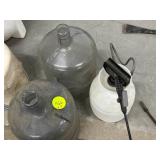 Two Plastic 5-Gallon Water Jugs and One Sprayer Ju