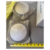 White PVC Pipe Fittings and Two Ceiling or Wall Li