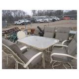 cream patio set with  6 chairs