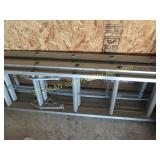 2 aluminum extension ladders