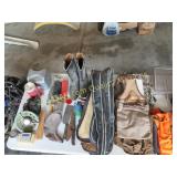 camping items, boots on top of table